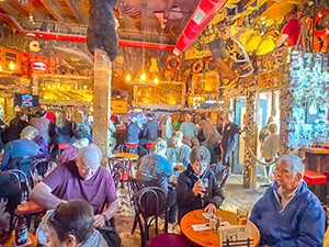 a crowd of people in a saloon