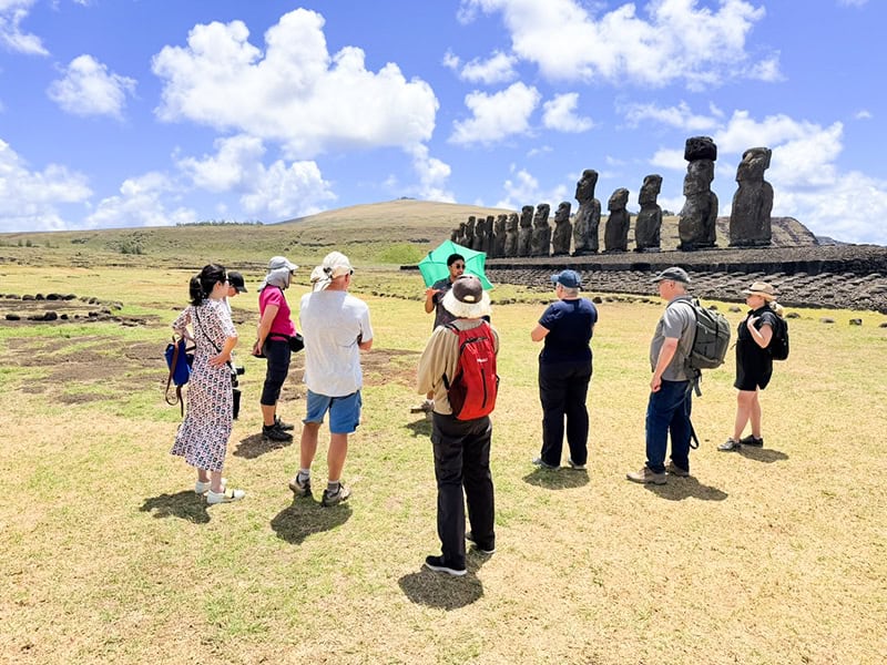 a tour group by Moai on Easter Island Chile