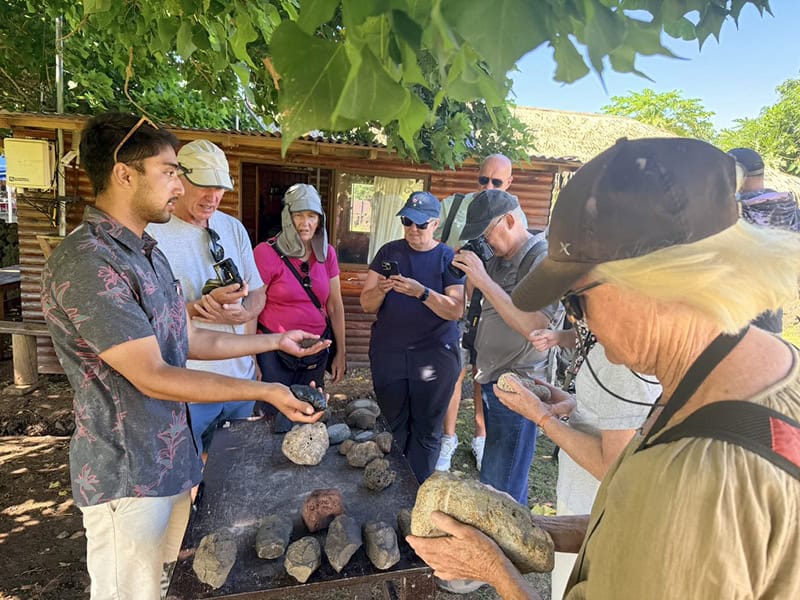 people looking at rocks