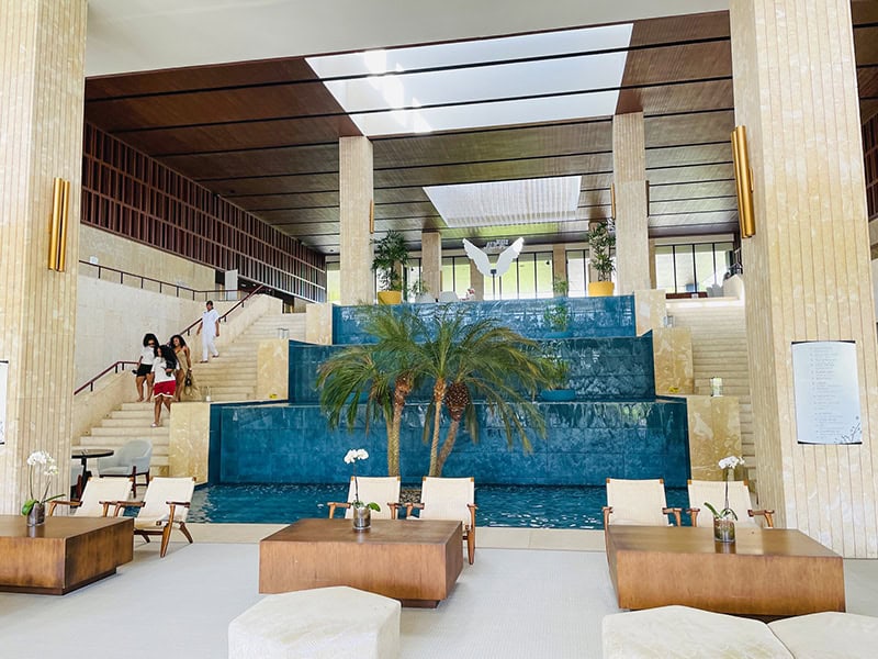 a blue waterfall in a hotel lobby